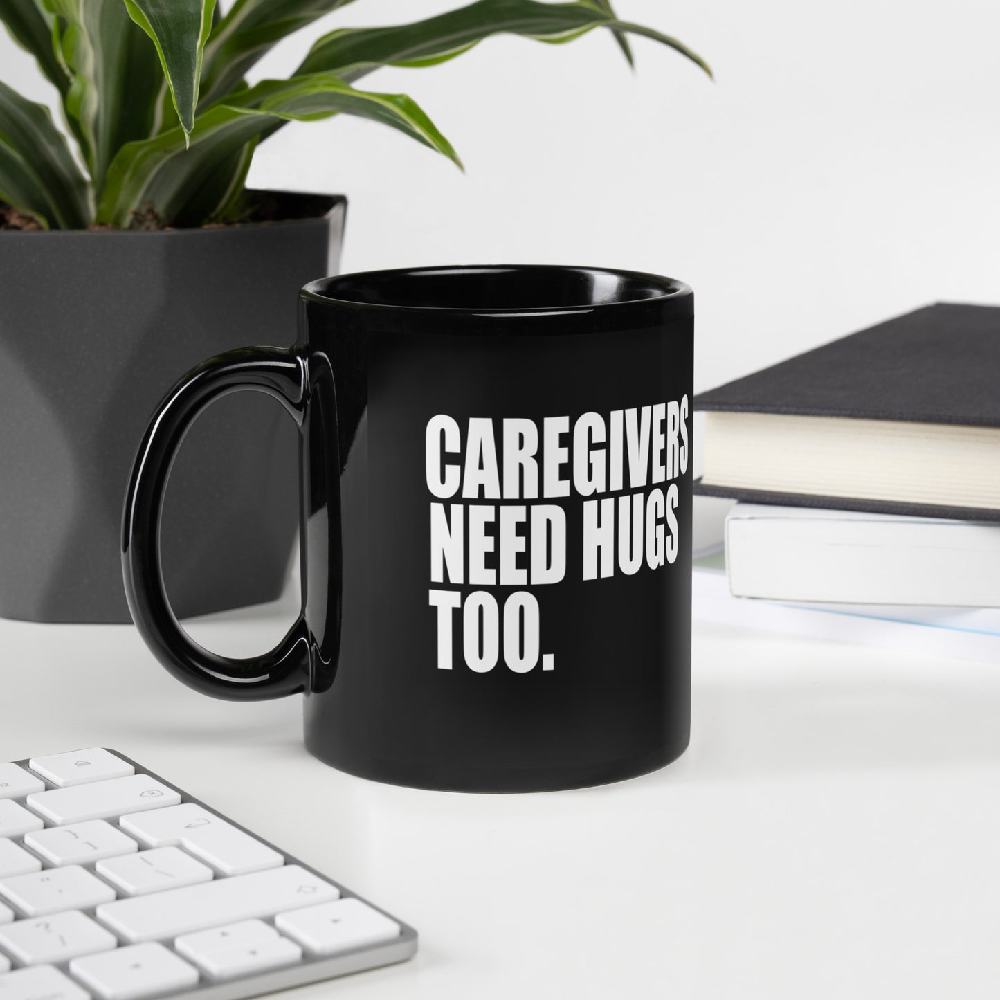 Caregivers need hugs too Black Glossy Mug